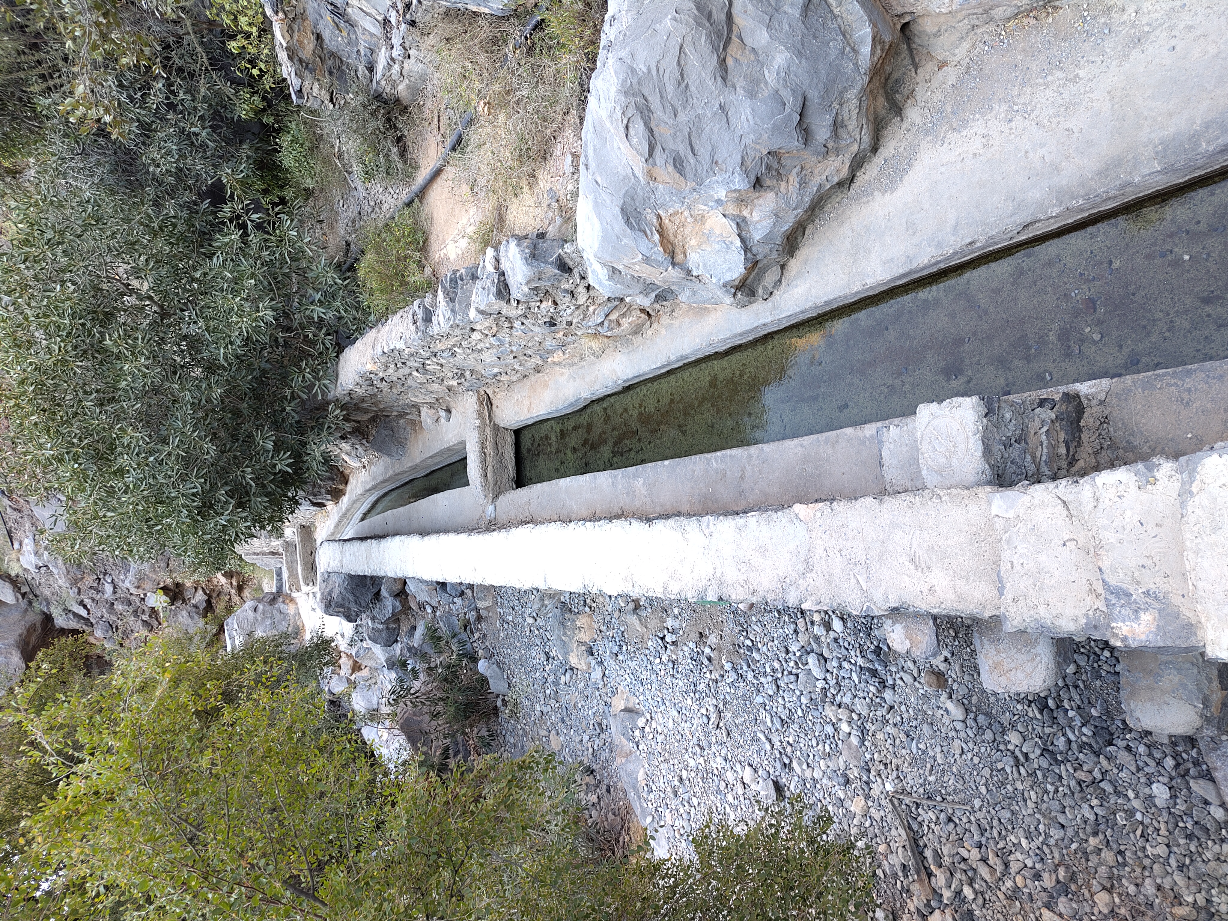 Aflaj - an irrigation/drinking water channel.